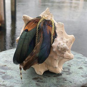 Embellished dangle feather earrings